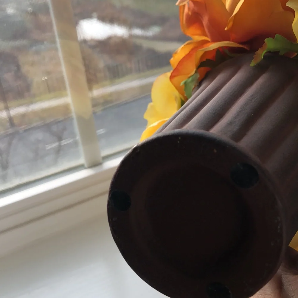 Pier 1 faux vase of flowers. 10” tall. Brown, orange, gold colors. New condition